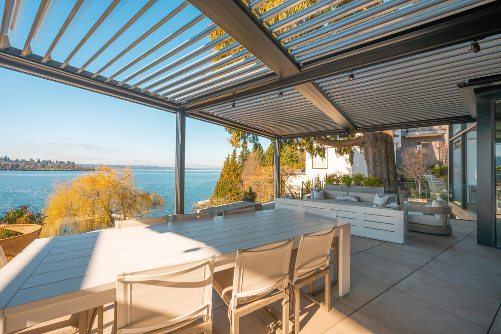 Sundance All Season motorized louvered pergola with louvers fully closed for rain protection, same patio