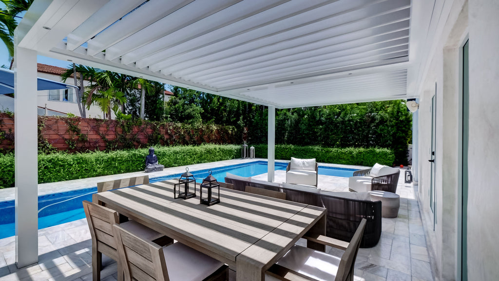 Sundance All Season louvered pergola as a poolside cabana in a premium backyard retreat